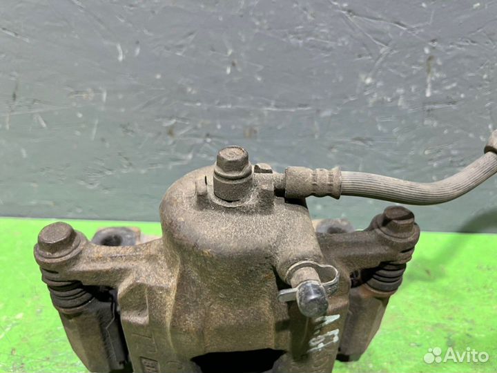 Суппорт левый Chevrolet Aveo T250 1.5 А15S3 2008