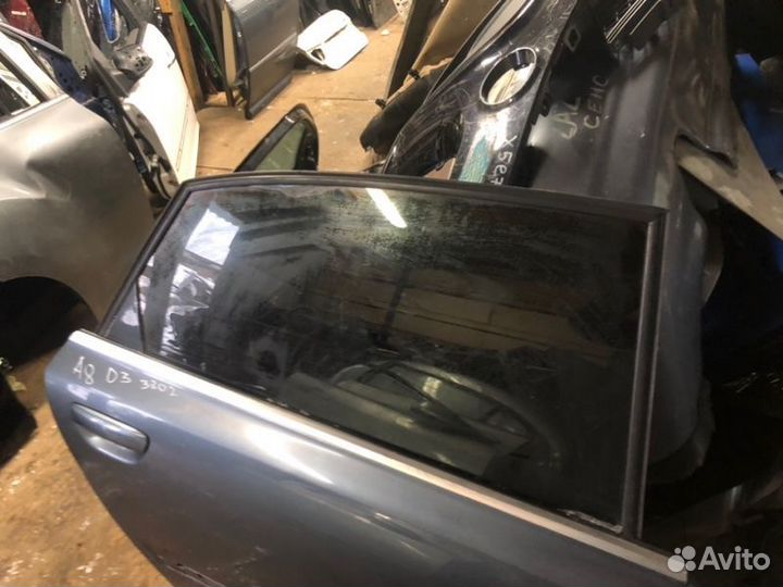 Стекло двери заднее правое Audi A8 D3