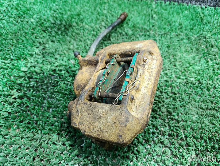 Суппорт тормозной задний правый Mitsubishi Pajero Sport