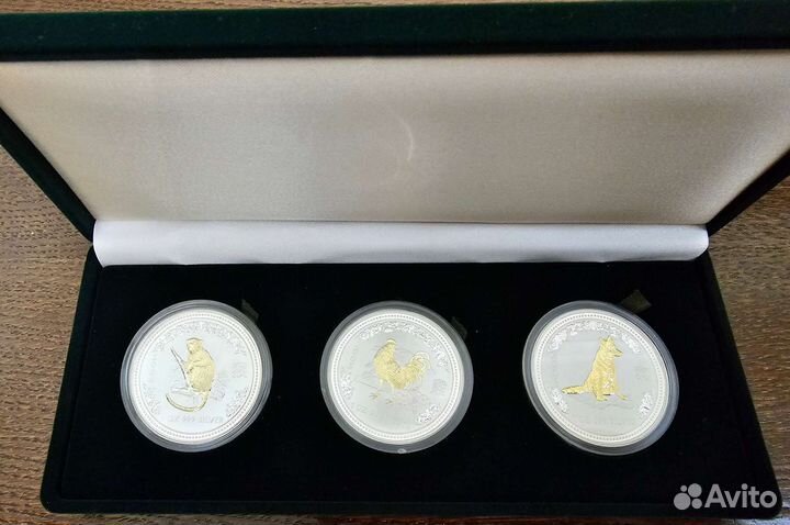 Серебряные монеты Восточный календарь с позолотой