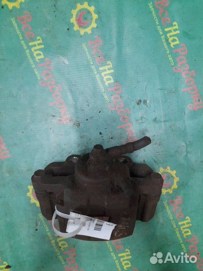 Суппорт передний левый Chevrolet Lanos седан 1.5