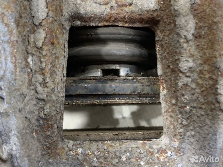 Суппорт тормозной задний левый KIA K5 DL3