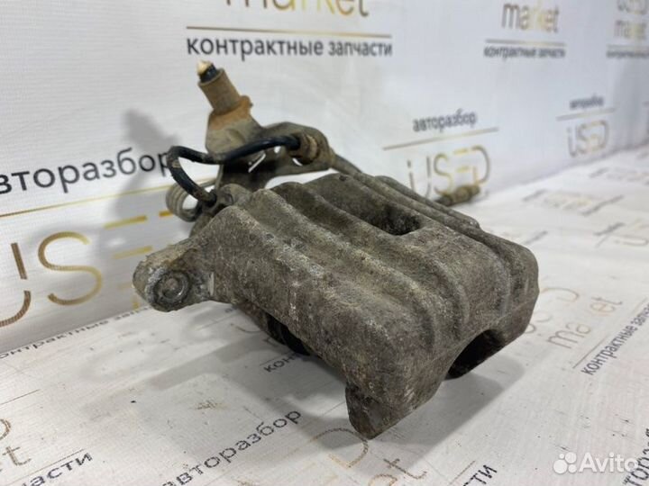 Суппорт задний левый Volkswagen Passat B5 1.6 AHL