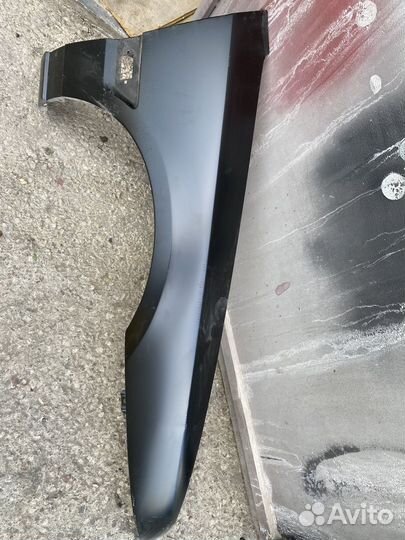 Крыло мазда 323 f
