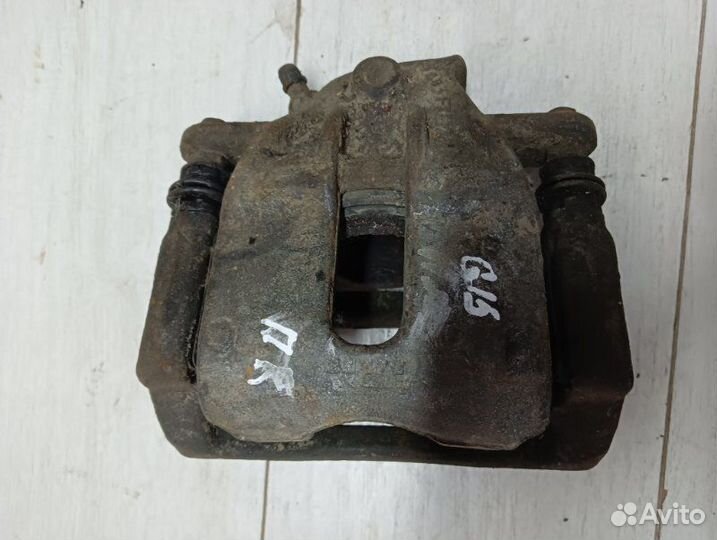 Суппорт тормозной передний правый Nissan Ниссан