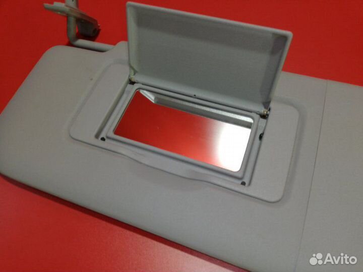 Козырек солнцезащитный передний левый