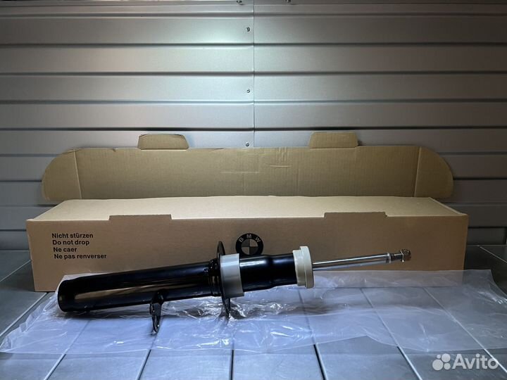 Амортизатор передний левый BMW 31316866607