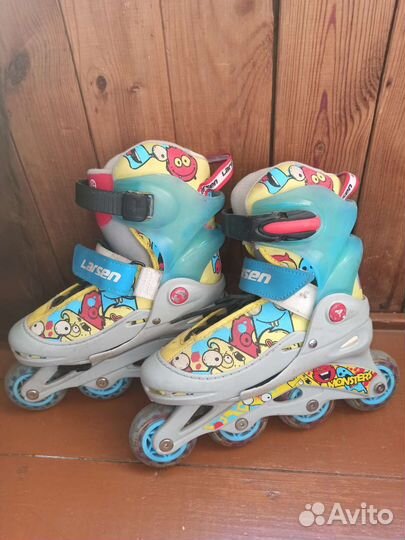 Роликовые коньки