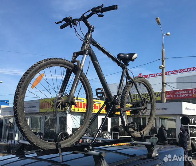 Крепление для велосипеда на крышу автомобиля