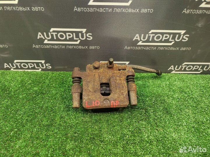 Суппорт задний правый Mitsubishi Lancer X седан