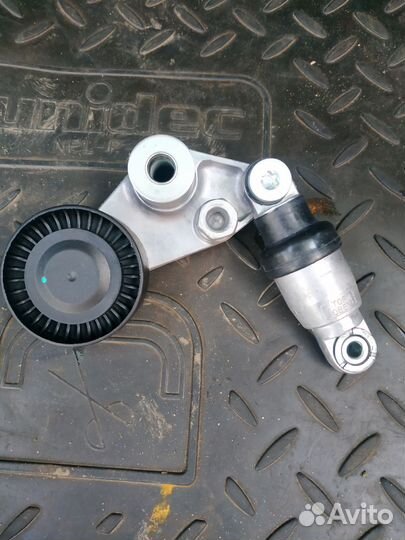 Натяжитель приводн. ремня ссанг енг кайрон,рекстон