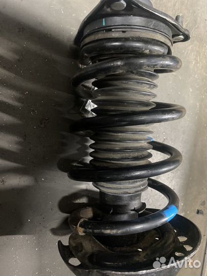 Амортизатор подвески левый передний киа Carens