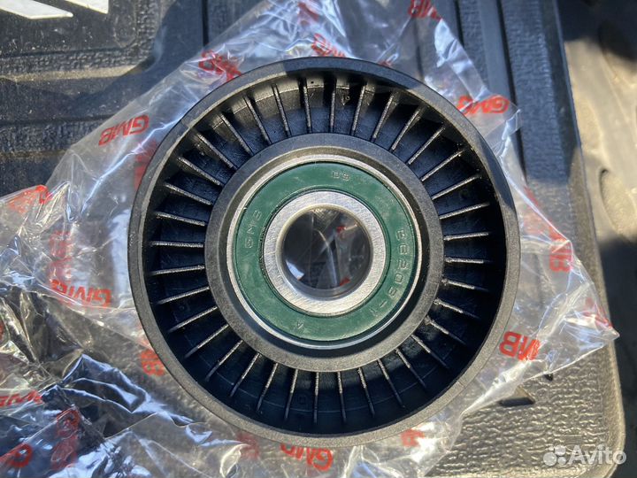 Натяжной ролик ремня генератора