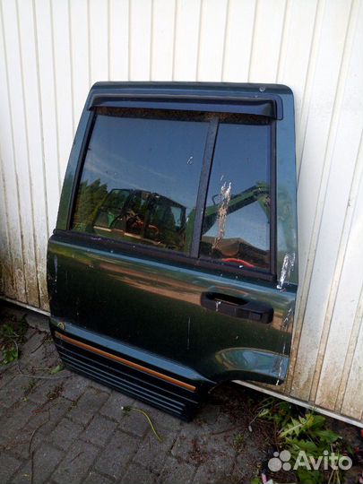 Дверь задняя левая Grand Cherokee