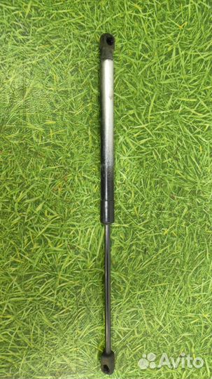 Амортизатор двери багажника Opel Astra H 2004-2015