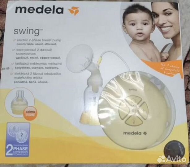 Молокоотсос medela электрический