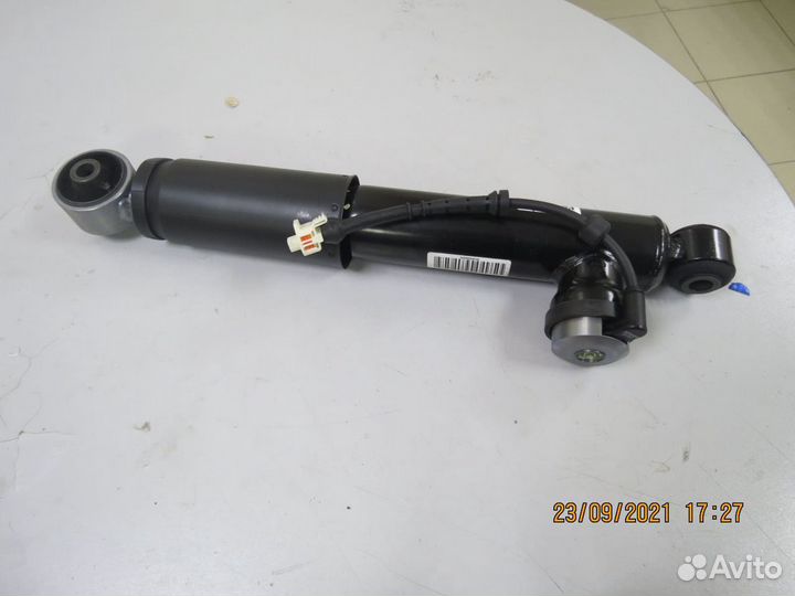 Амортизатор задний левый Opel Astra H / Family 200