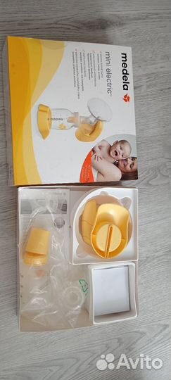 Молокоотсос medela электрический