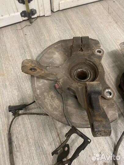 Кулаки поворотные в сборе Mitsubishi Lancer X