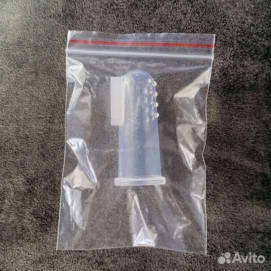 Зубная щетка на палец