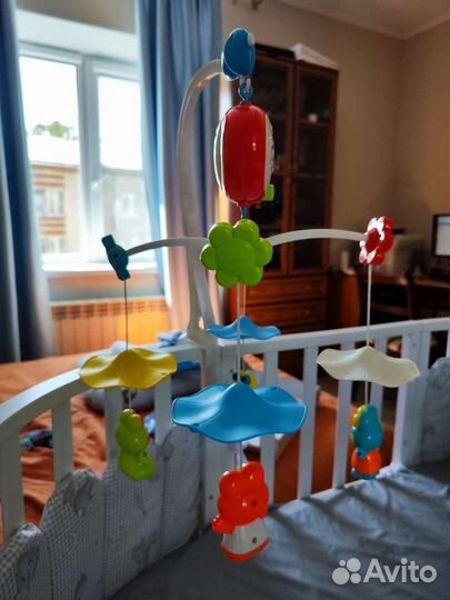 Детский мобиль в кроватку музыкальный