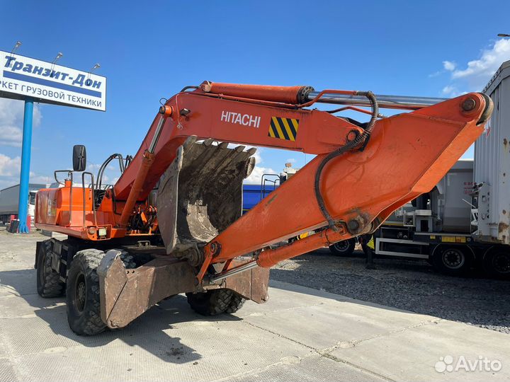 Колёсный экскаватор Hitachi EX160W, 2001