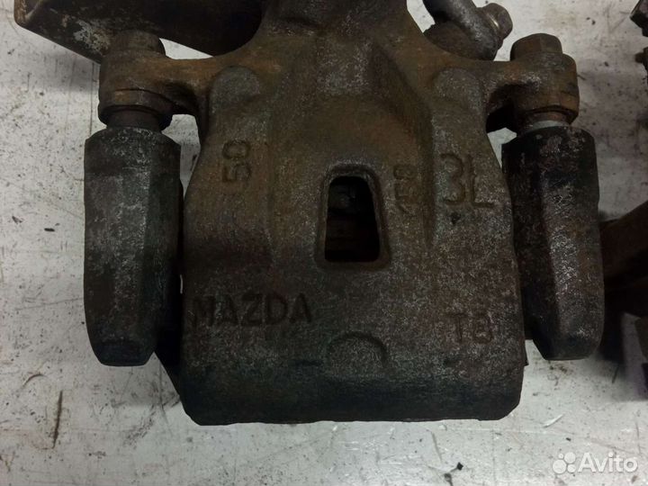 Суппорт тормозной задний mazda CX 5