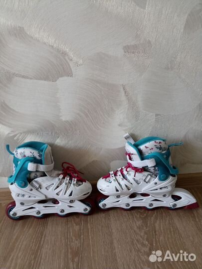 Коньки роликовые