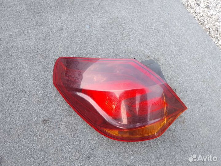 Фонарь задний левый Opel Astra J