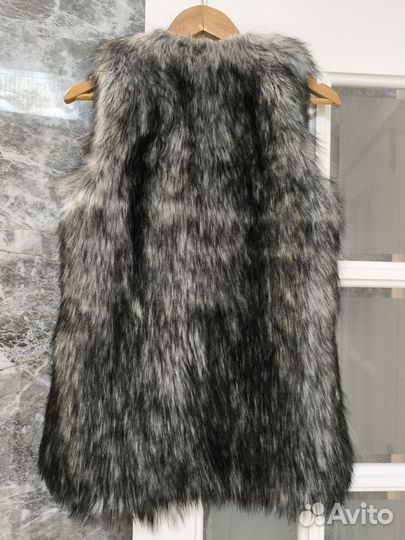 Жилетка меховая женская