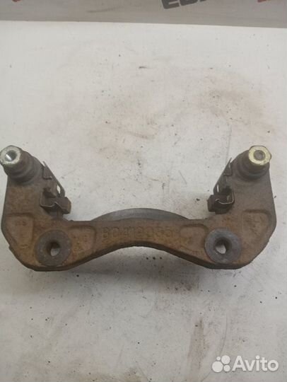 Скоба суппорта передняя правая Ssang Yong Kyron