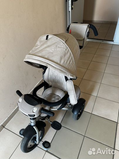 Бежевый детский велосипед с ручкой