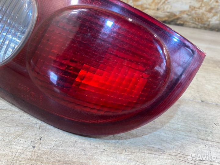 Фонарь задний левый Kia Clarus универсал 1.8 I 16V