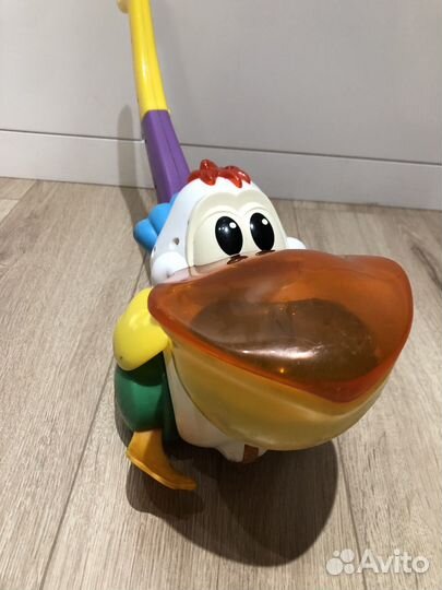 Детская каталка пеликан