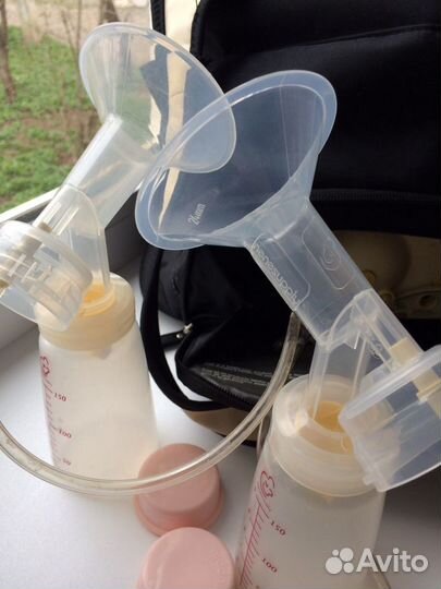 Молокоотсос Medela