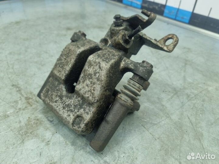 Суппорт тормозной задний правый Renault Fluence