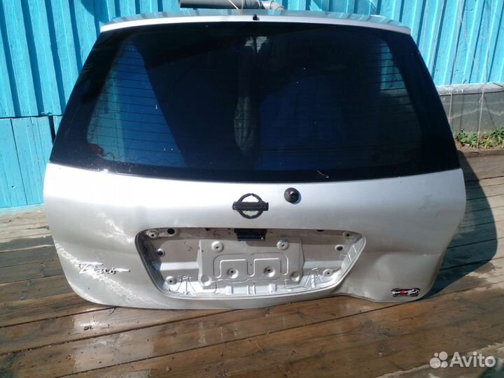 Крышка багажника nissan tino