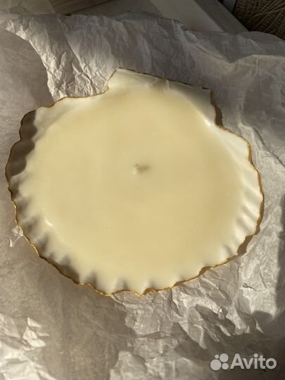 Свеча в раковине морского гребешка