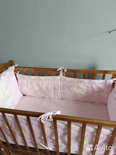 Детская кровать с продольным маятником