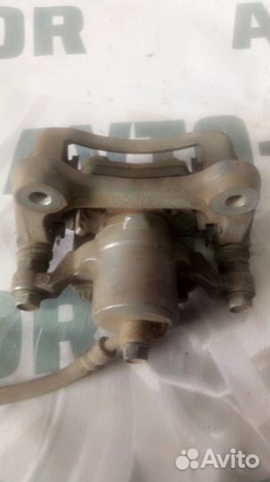 Суппорт задний Киа Оптима 3