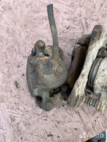 Передние Суппорта Nissan Almera N15 пара