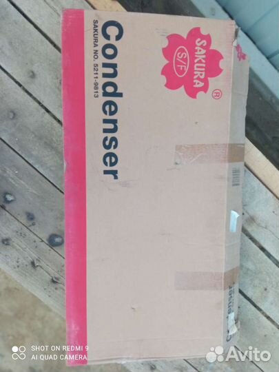 Радиатор кондиционера Sakura для Honda Fit 01-07