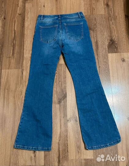 Джинсы клешь женские