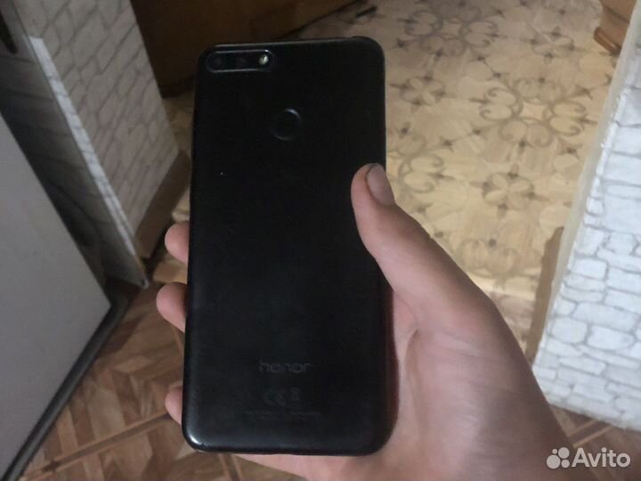Телефон honor 7c
