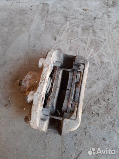 Суппорт передний левый Daewoo Nexia N150 2012