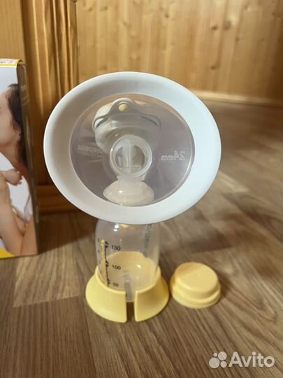 Молокоотсос medela ручной