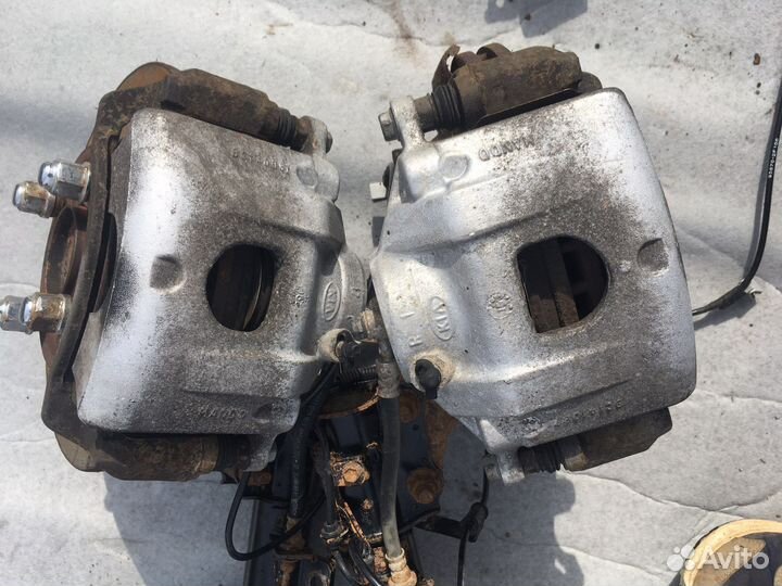 Kia cerato1 передний тормозной суппорт