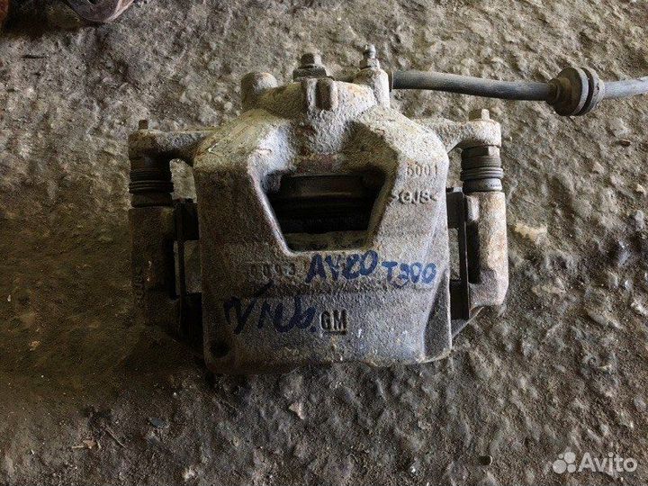 Суппорт передний левый Chevrolet Aveo Т300