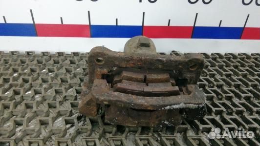 Суппорт тормозной задний правый toyota corolla E12