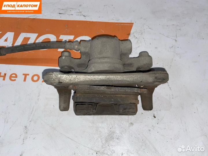 Суппорт тормозной задний правый Mitsubishi Lancer